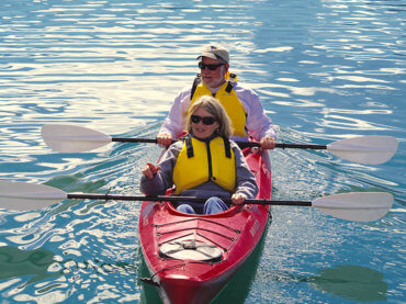 Couple Prepares to go Sea Kayaking