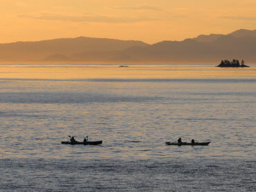 Alaska Sea Kayakers on Scenic Sunset Trip